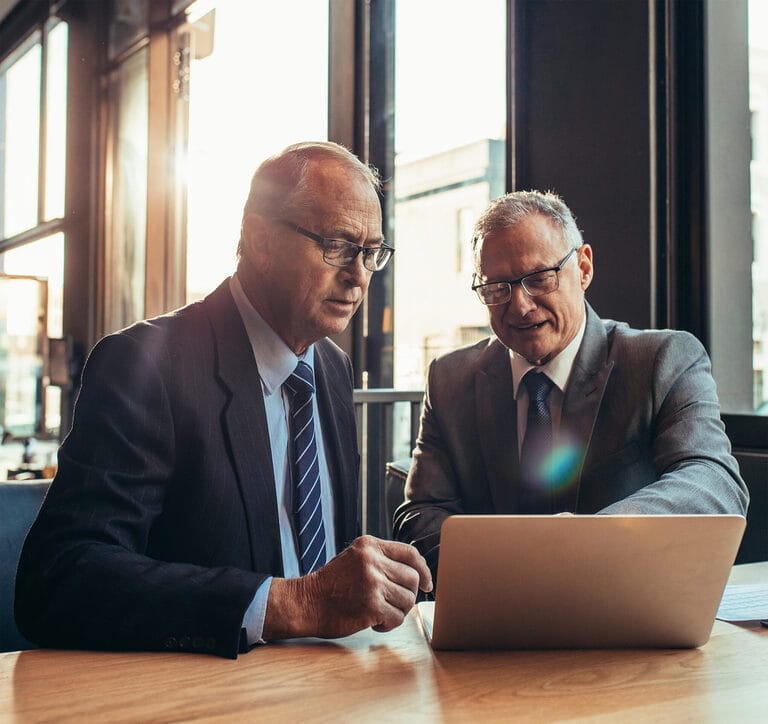 Photo of two HR professionals meeting